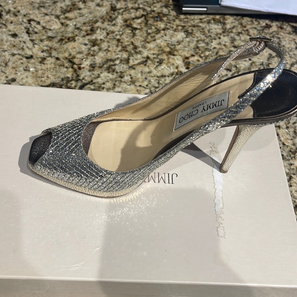 Jimmy Choo sandal pumps.
